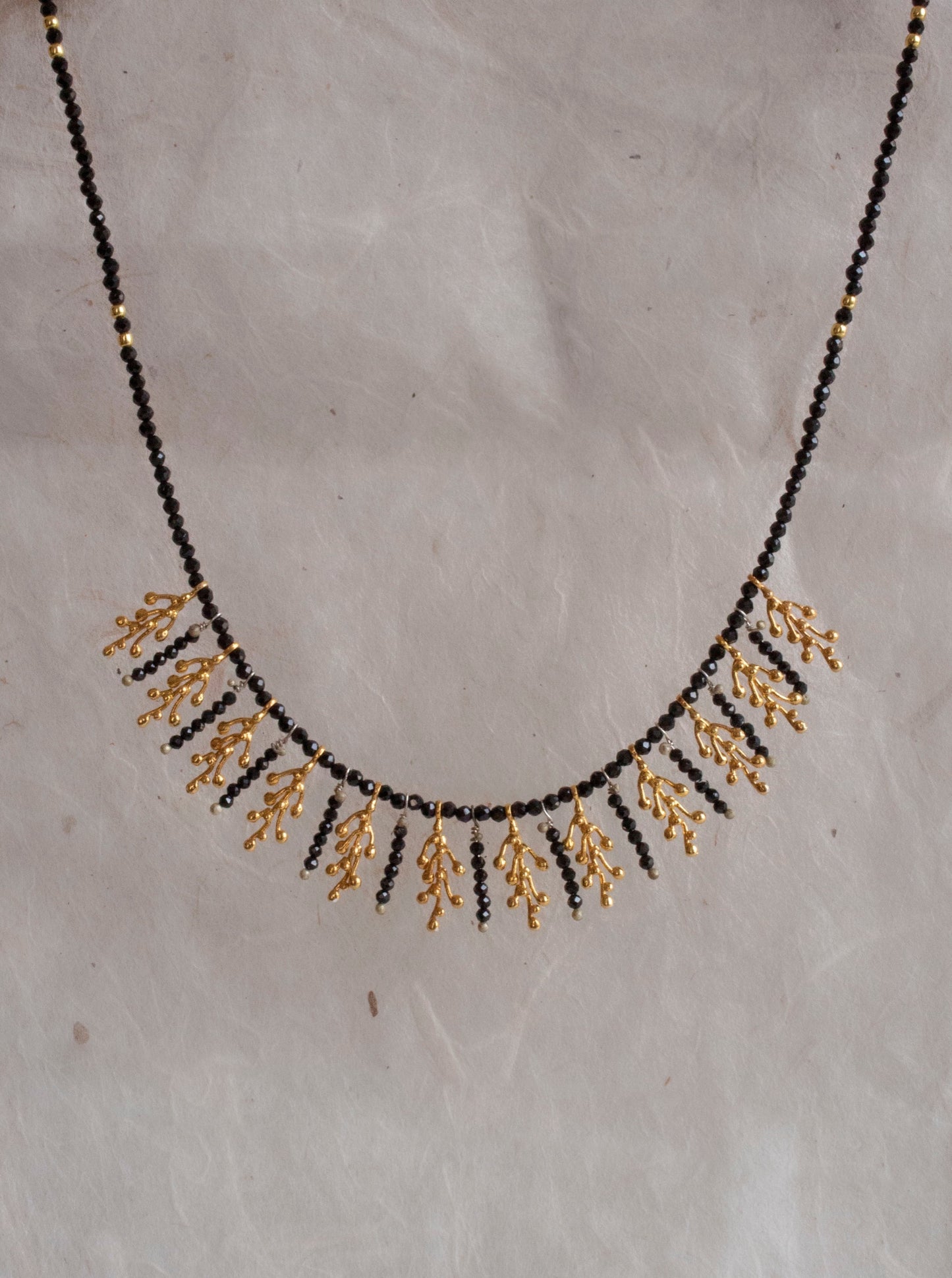 Hecate Necklace, onyx gemstones, gold leaves