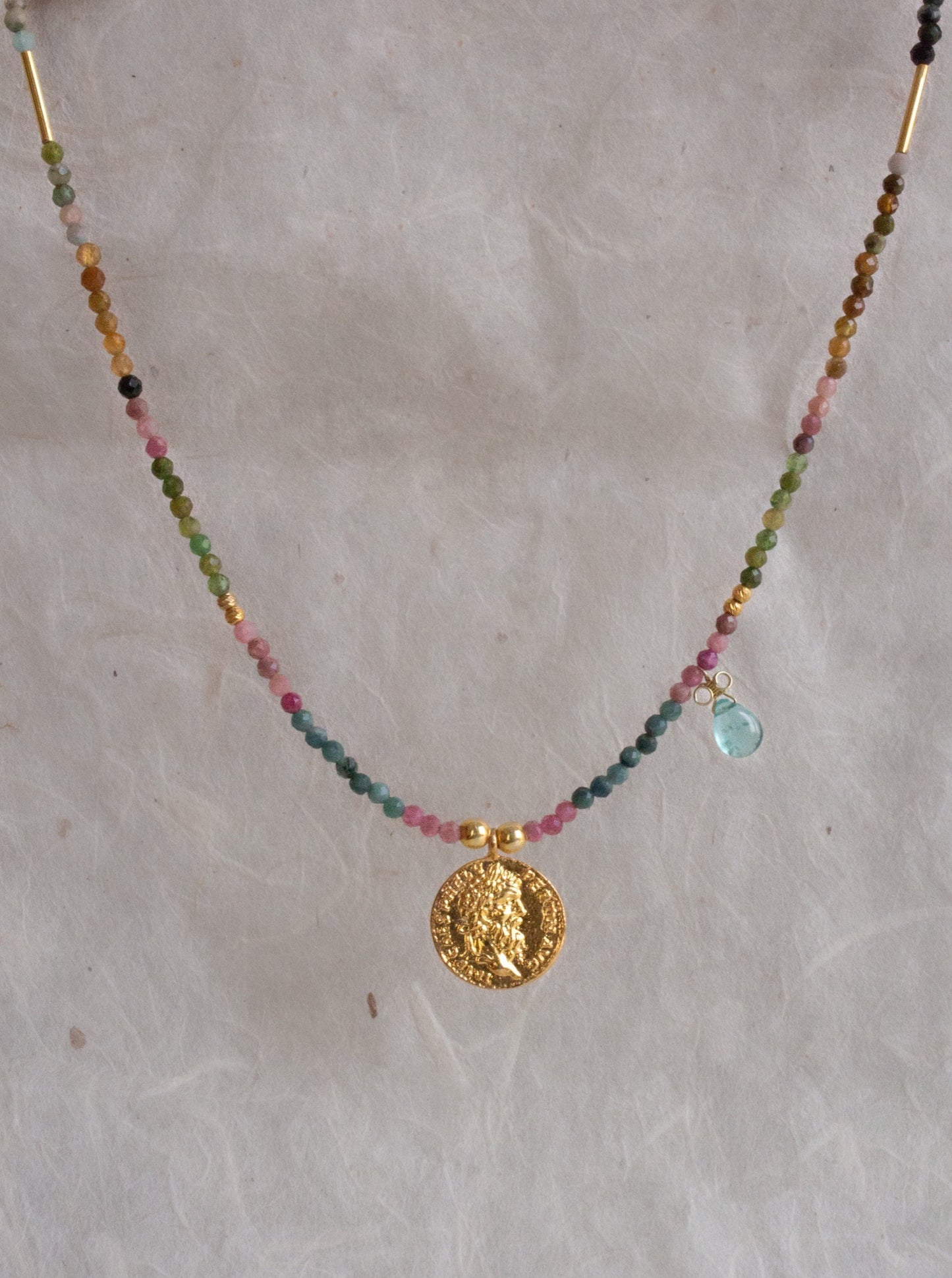 Zeus necklace with colourful tourmaline stones and a single aquamarine drop