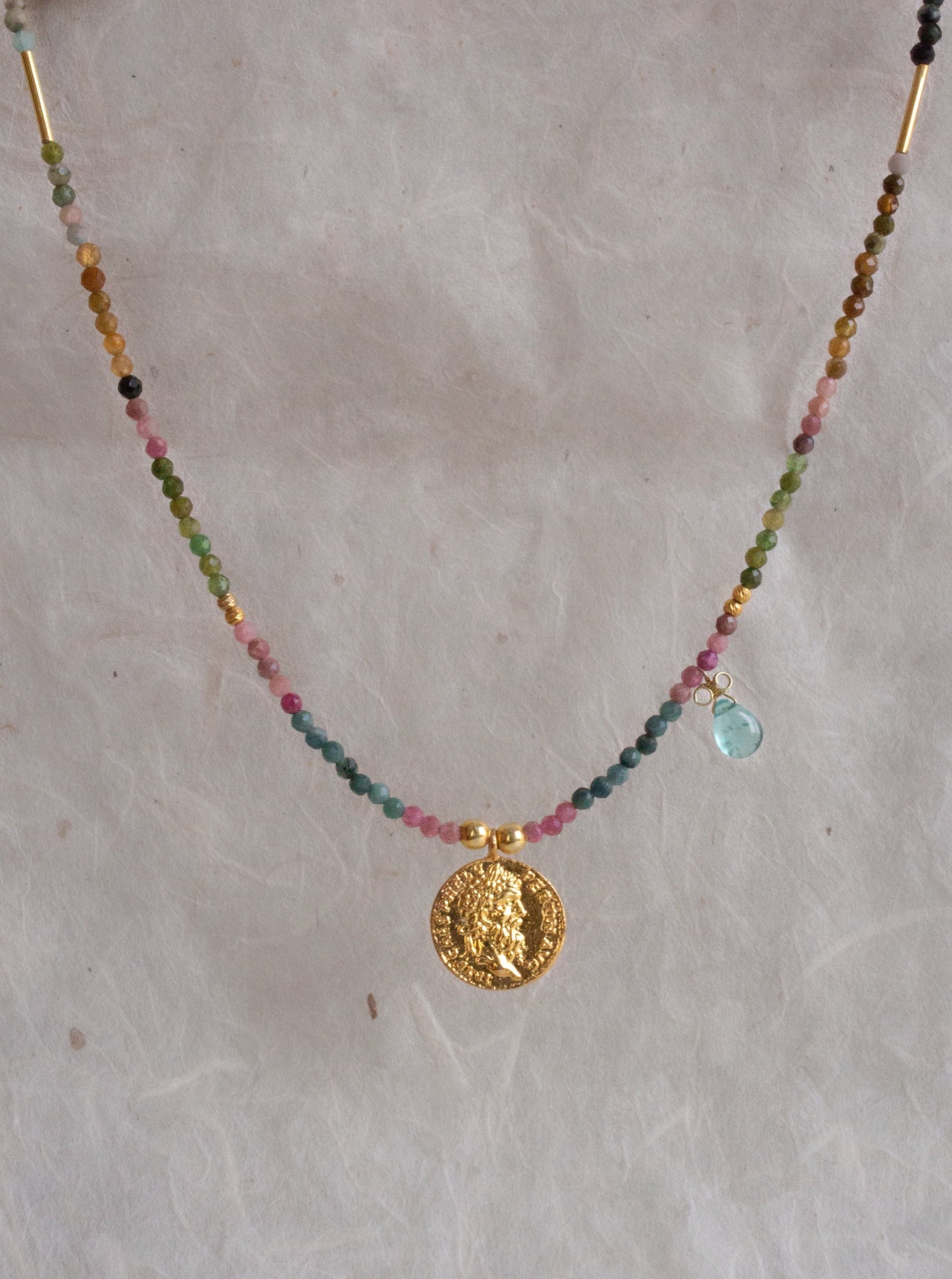 Zeus necklace with colourful tourmaline stones and a single aquamarine drop