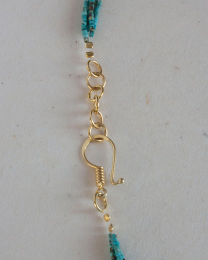 Roman hook detail of turquoise necklace