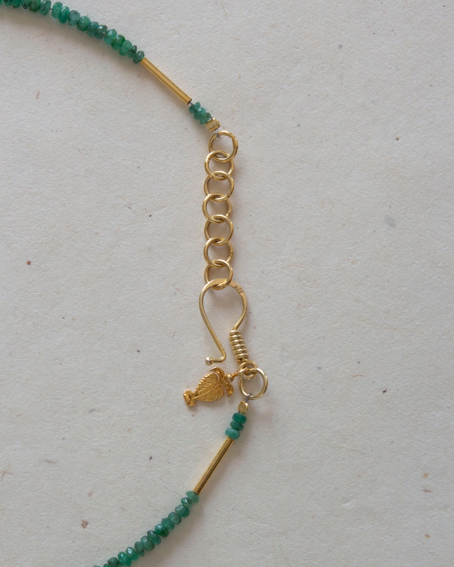 Hook detail of emerald necklace
