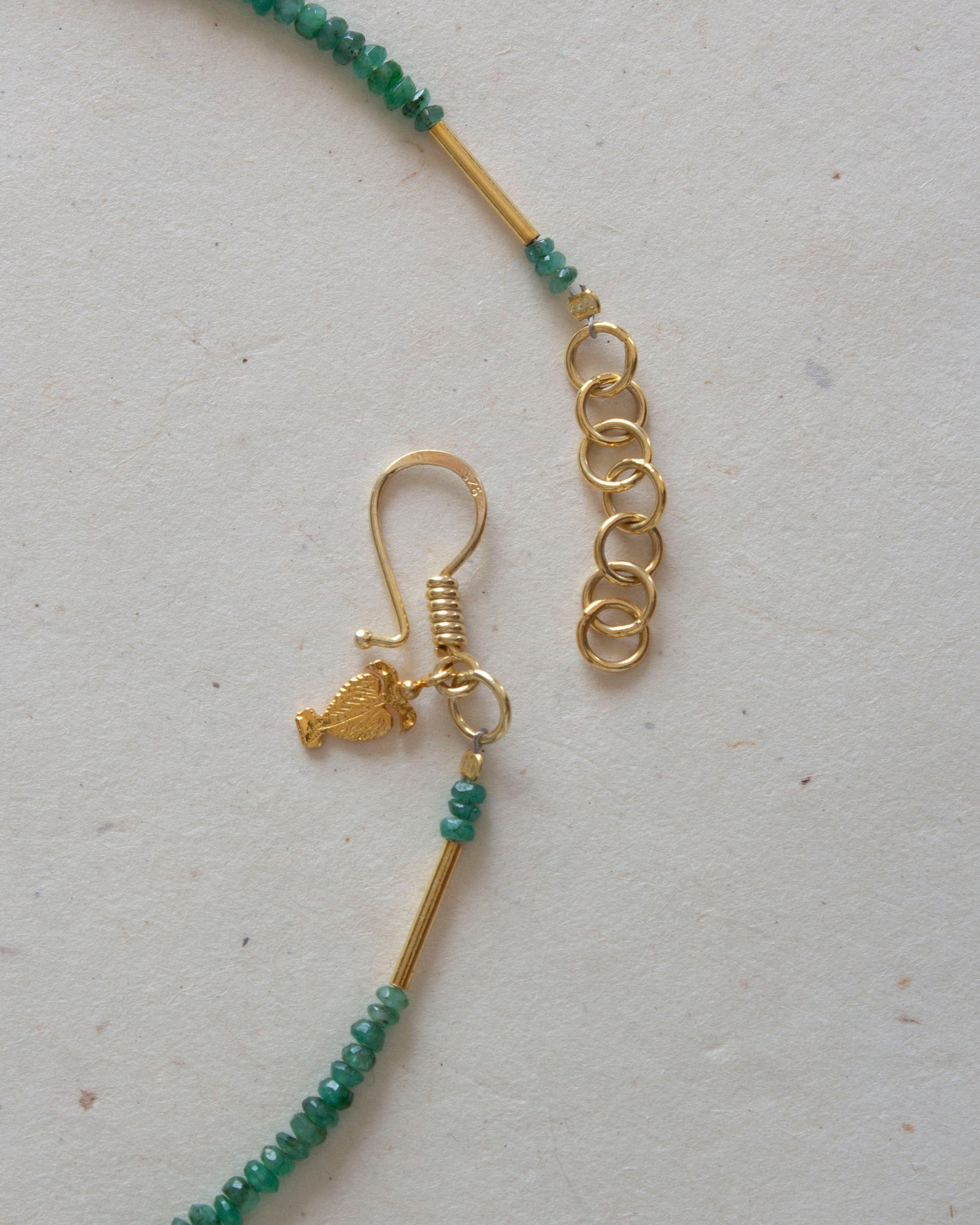Roman Hook detail emerald necklace 