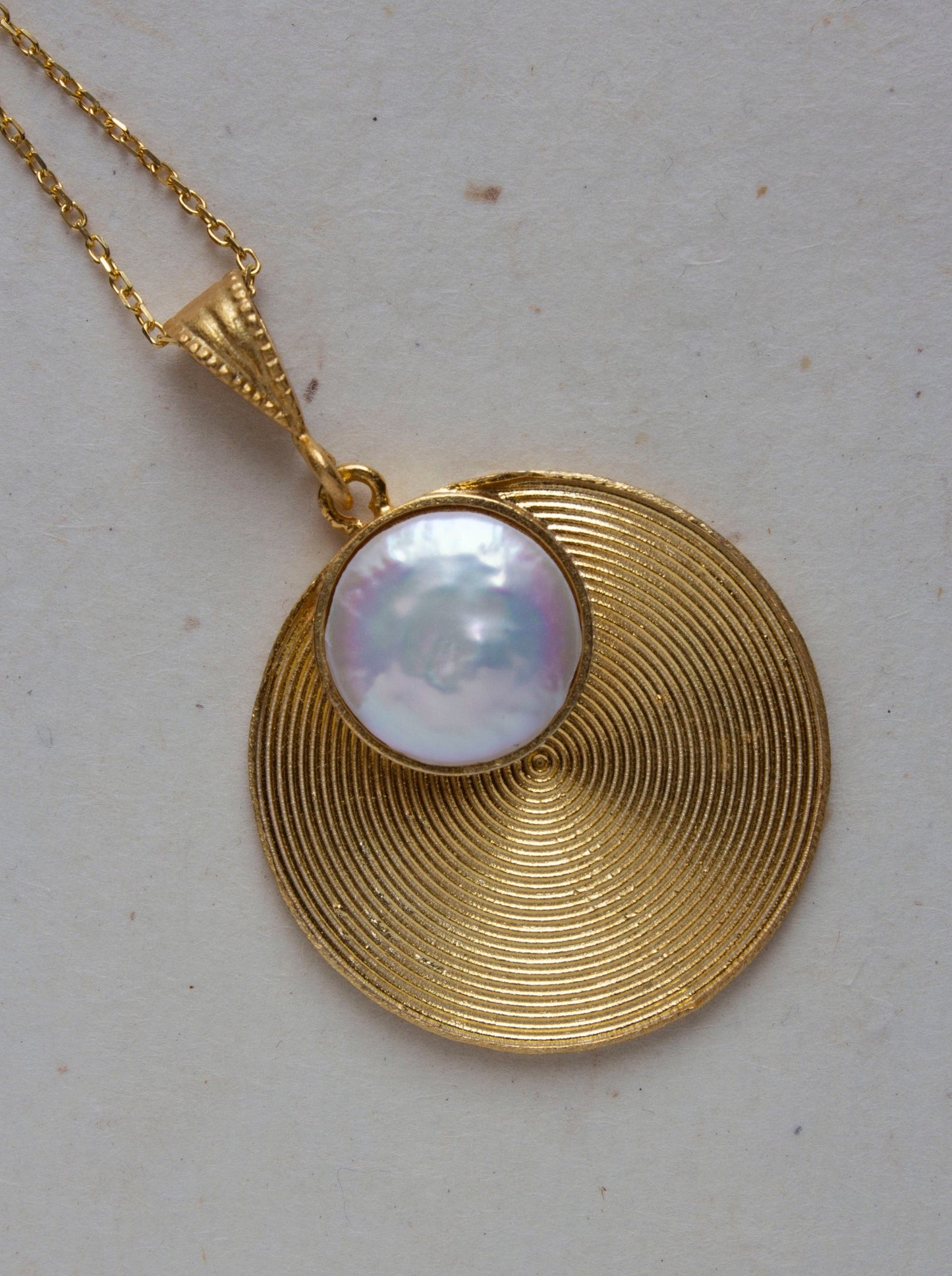 Gold plated silver pendant with pearl, round gold pendant
